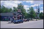 Mustang at gas station, Maine, May 2000