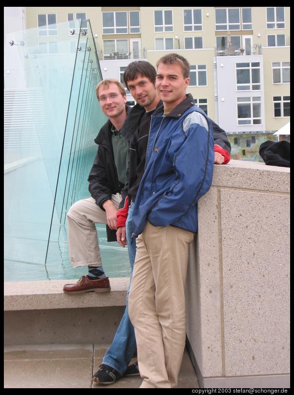 three brothers in front of the glass museum, Tacoma, WA